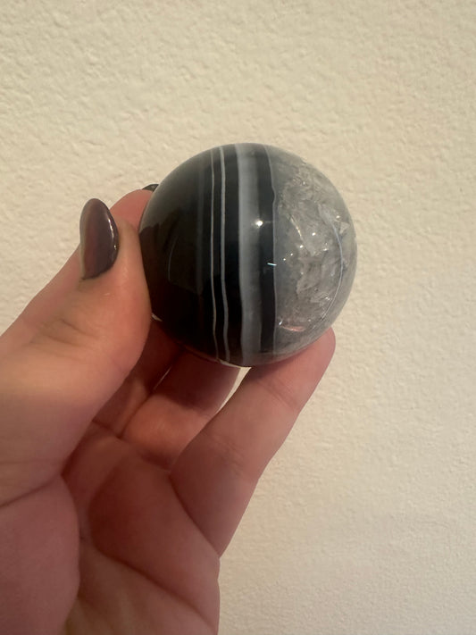 Black Sardonyx in Quartz Sphere
